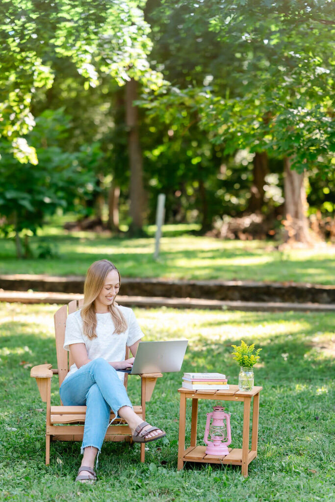 Pinterest manager taking a fit call via Google Meet on her computer while smiling