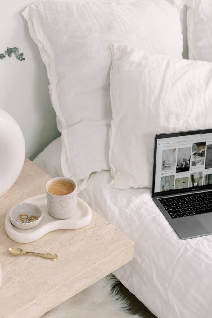 Stock photo of a bed and computer, perfect for entrepreneurs